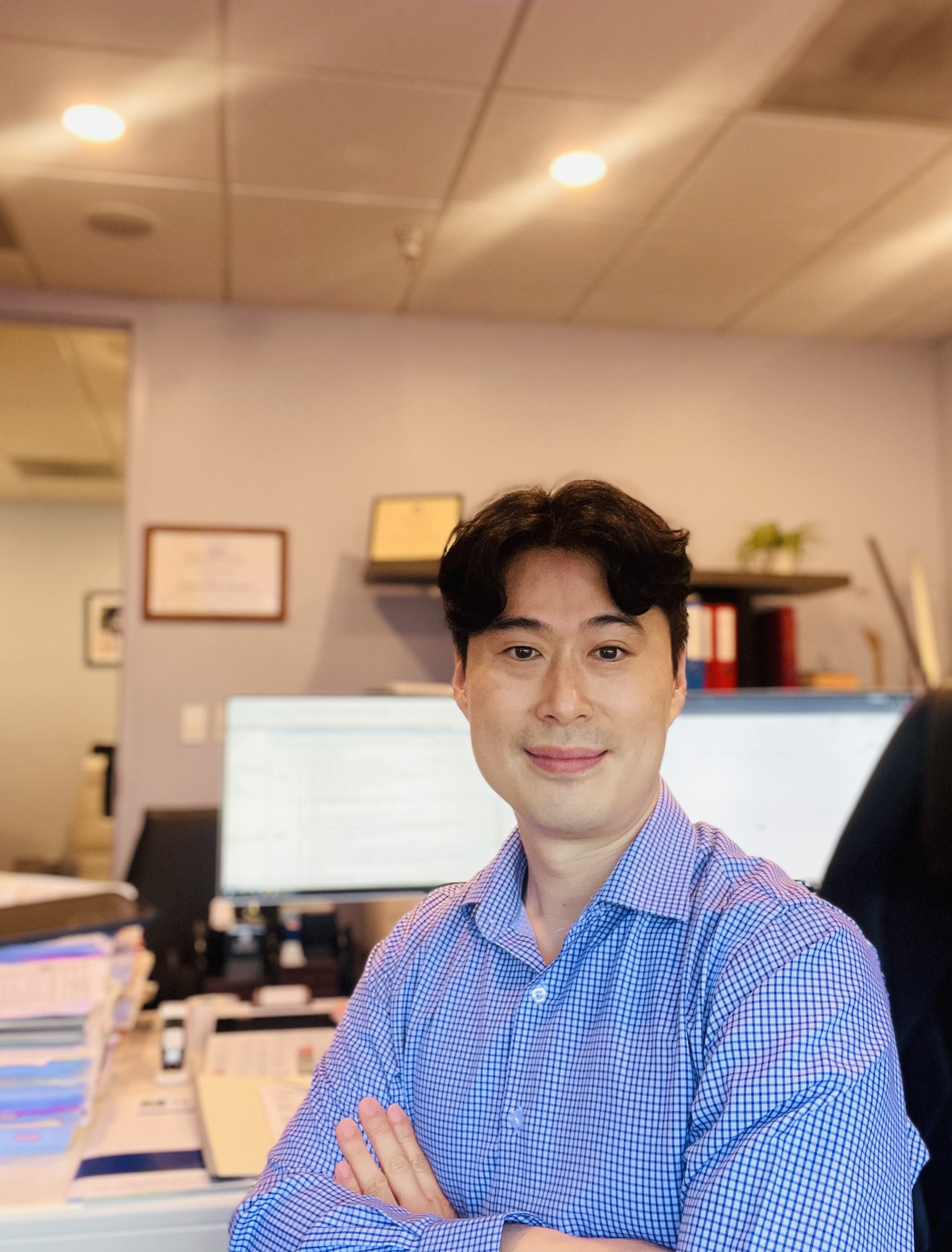 Jay Baek, CPA and EA, in his office